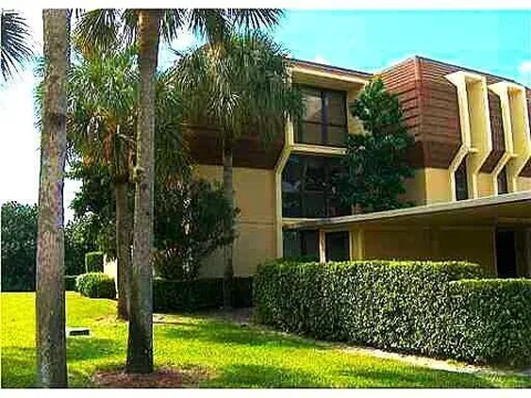5250 WOODLAND LAKES DRIVE #231