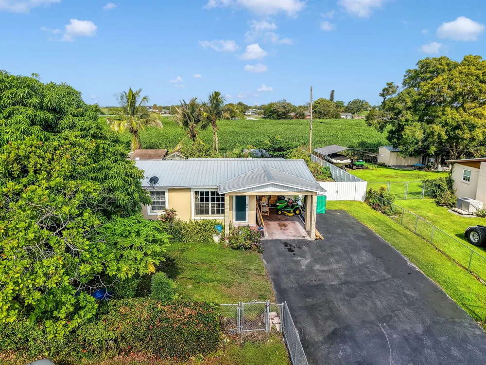1048 WHITAKER ROAD Belle Glade, FL 33430