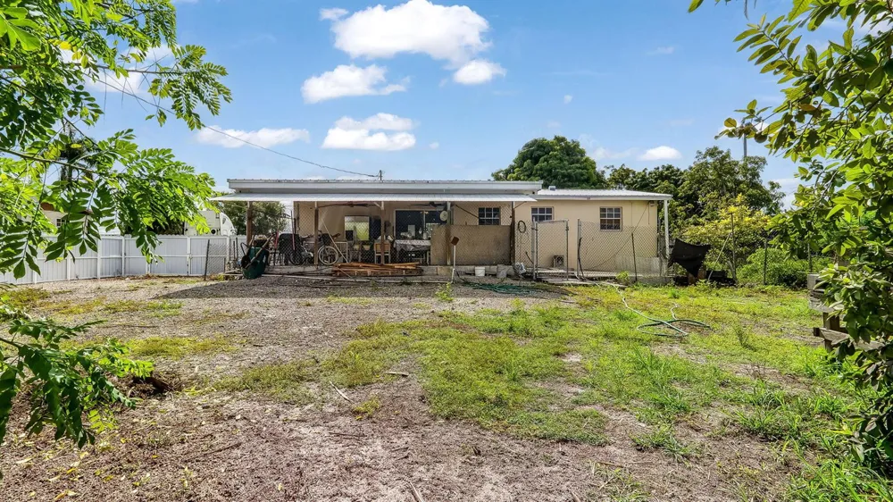 1048 WHITAKER ROAD Belle Glade, FL 33430