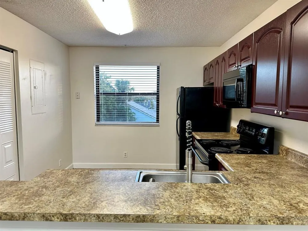 5641 RIVERSIDE DRIVE #306B1 Coral Springs, FL 33067