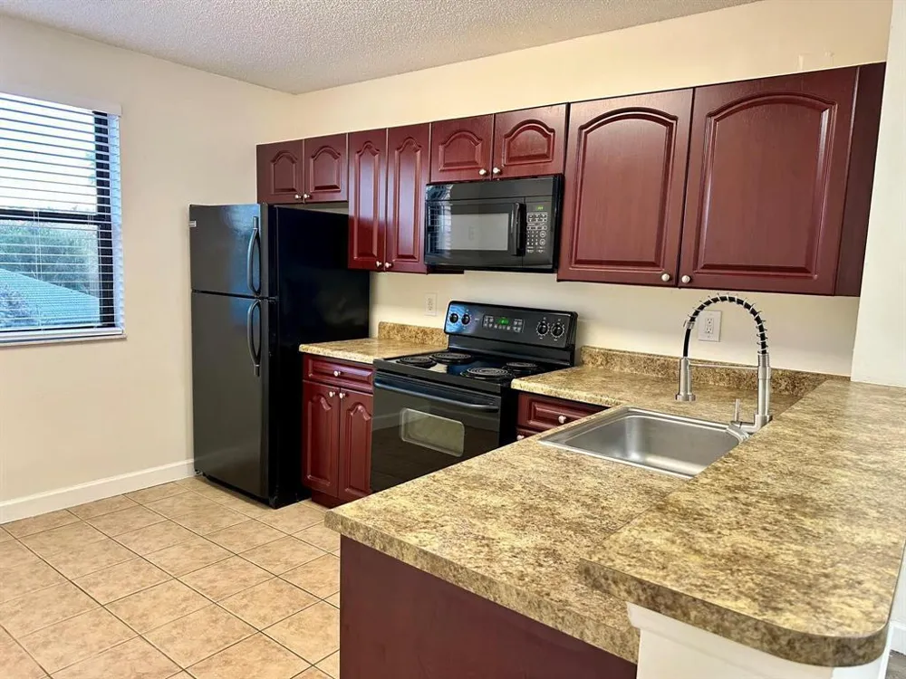 5641 RIVERSIDE DRIVE #306B1 Coral Springs, FL 33067