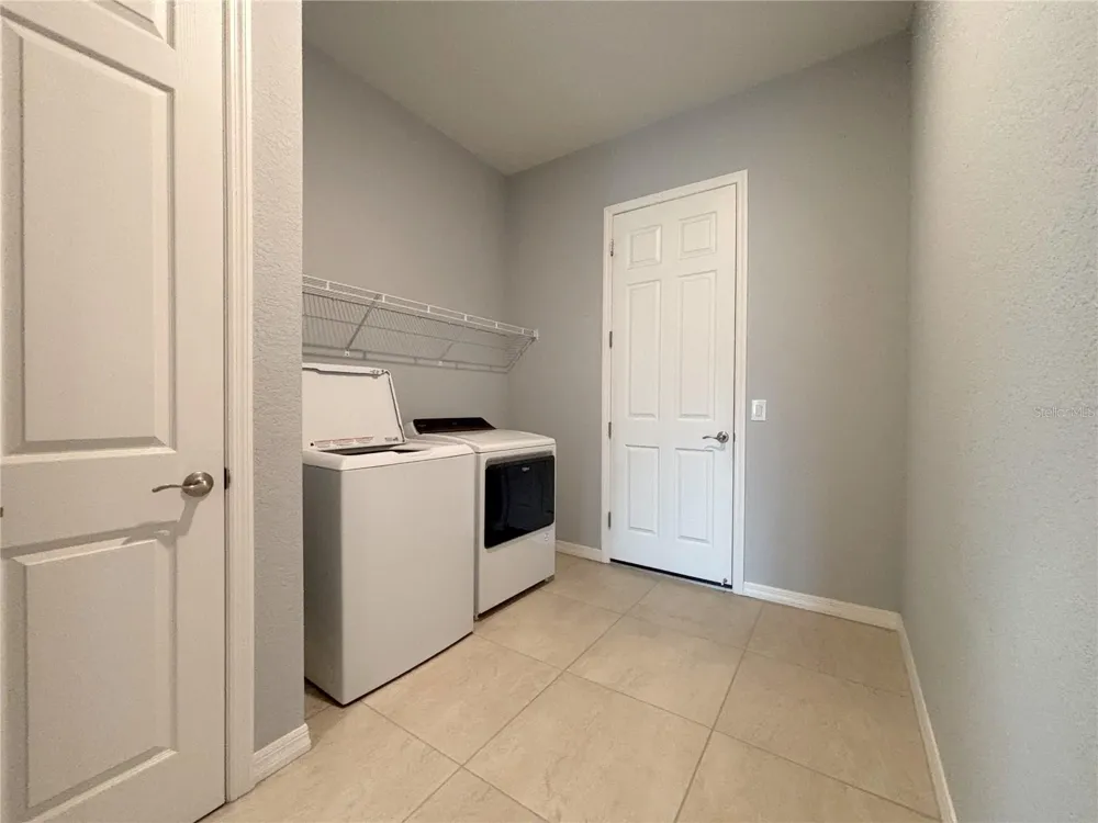 1124 SAWGRASS DRIVE Winter Haven, FL 33884
