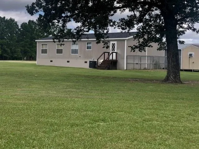 10932 Blackland Road Willis, TX 77318