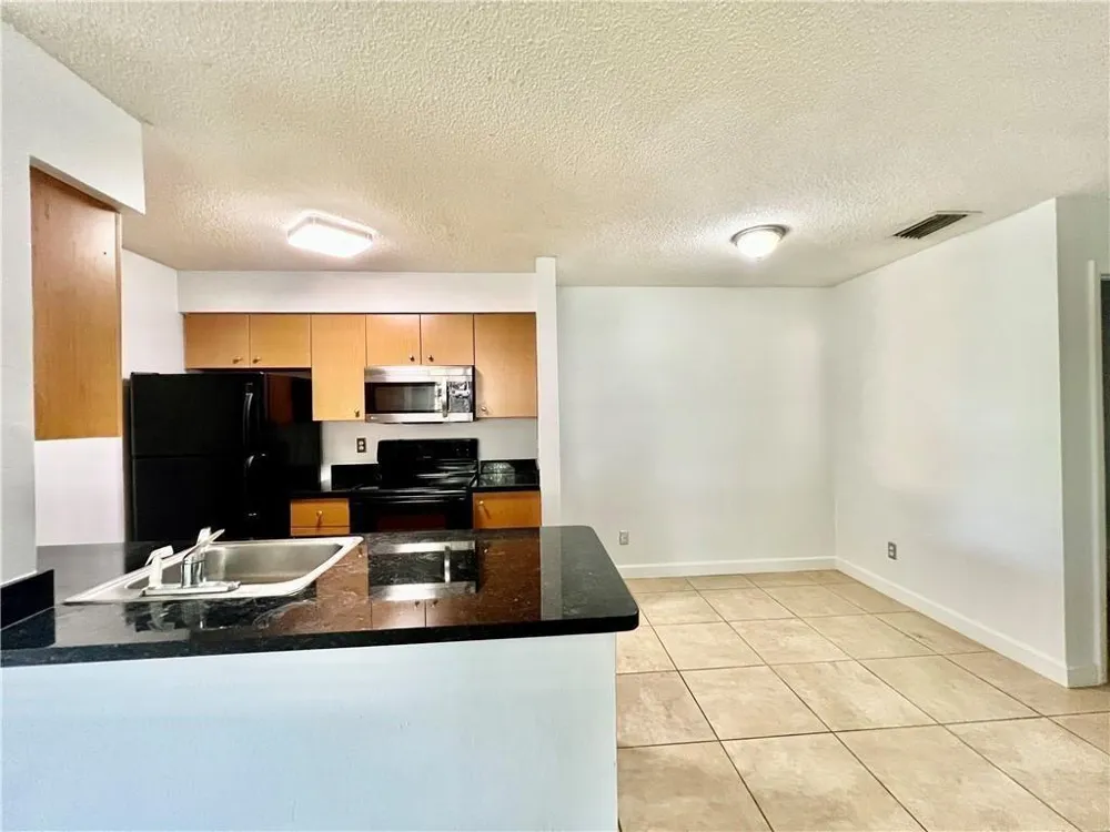 741 NW 104TH AVENUE #203 Pembroke Pines, FL 33026