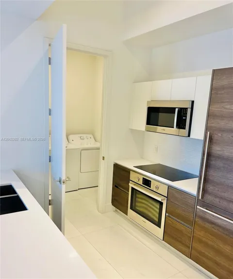 301 Altara Ave #210