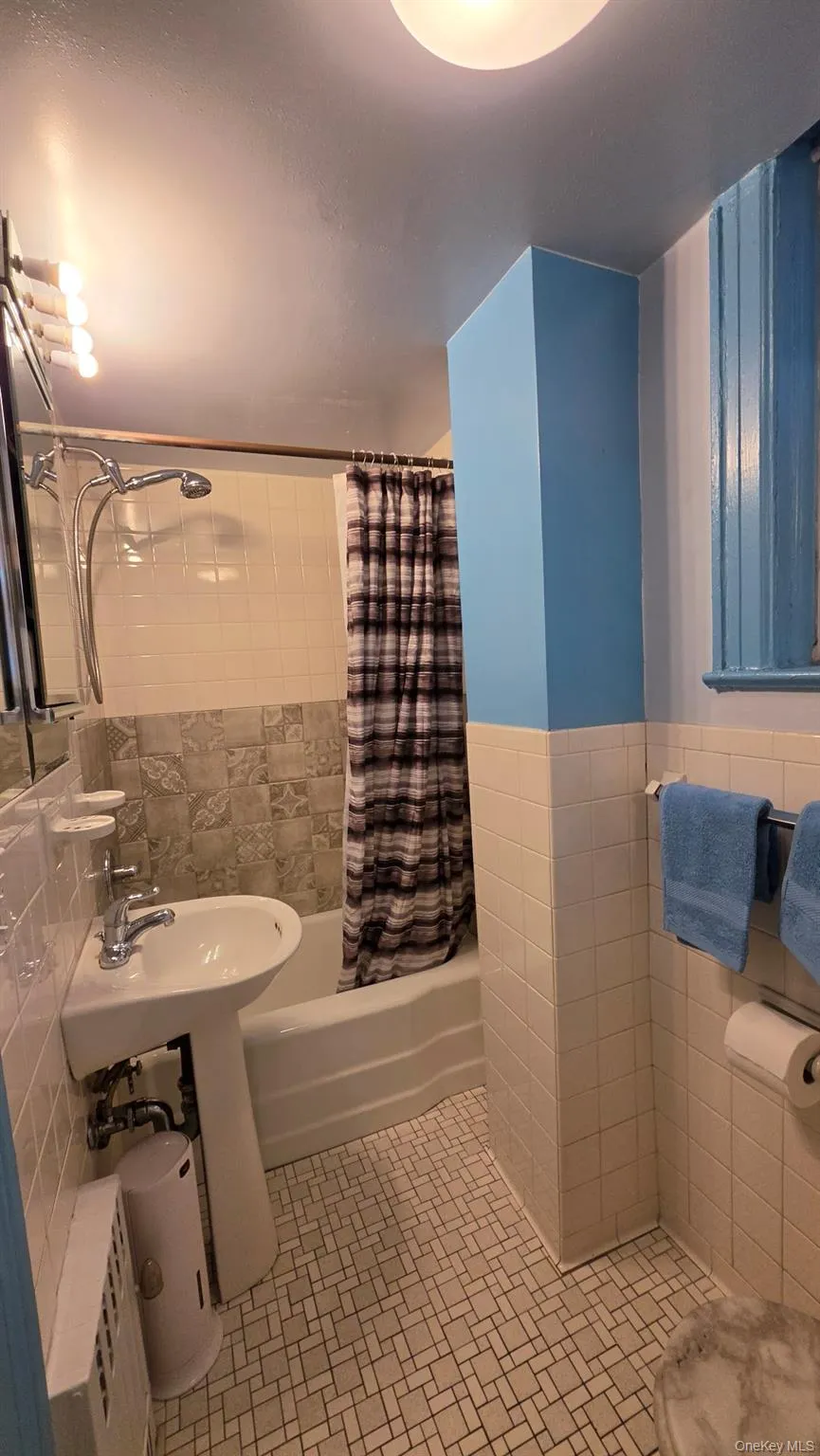 63-28 82nd Place Middle Village, NY 11379