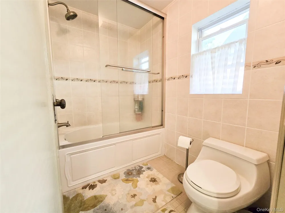 56-16 212 STREET Bayside, NY 11364
