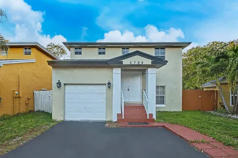 5789 WOODLAND POINT DRIVE