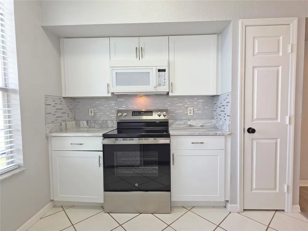 9018 LAKE CHASE ISLAND WAY #9018 Tampa, FL 33626