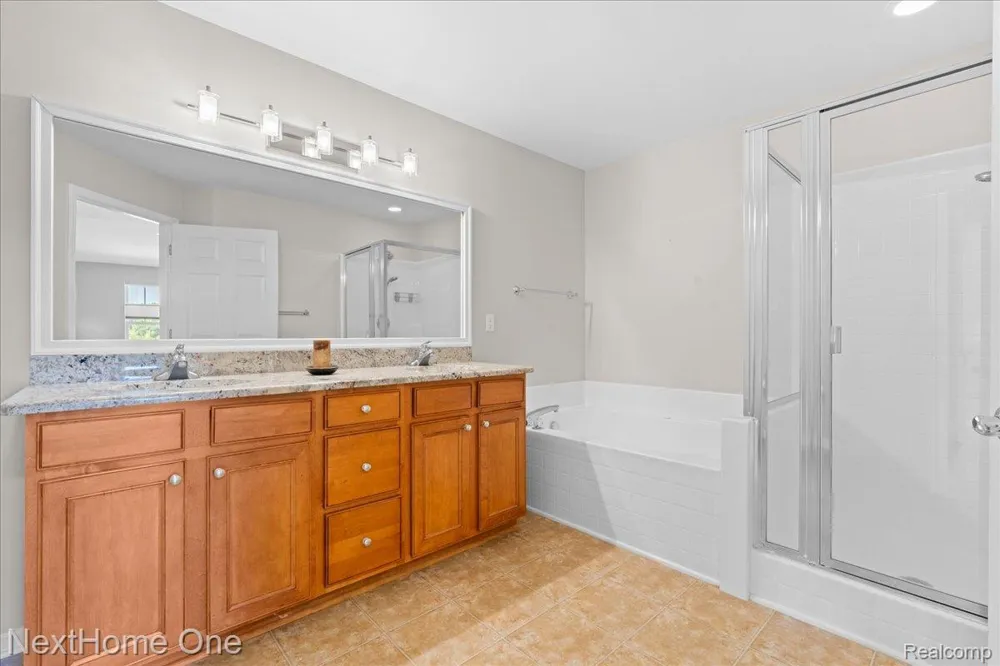 10083 Ridge Run Street #24 Hartland Township, MI 48855