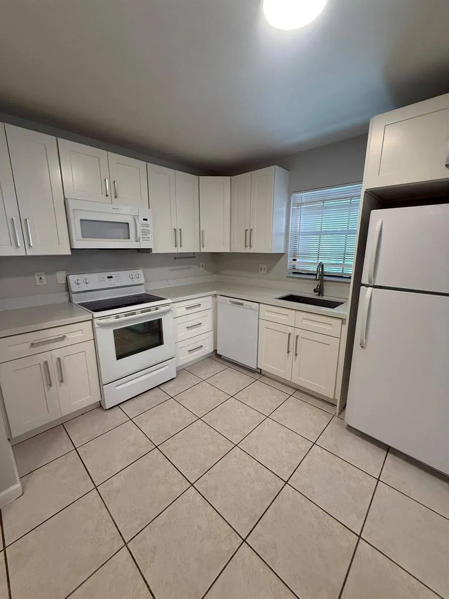 3647 NW 94TH AVENUE #4H Sunrise, FL 33351