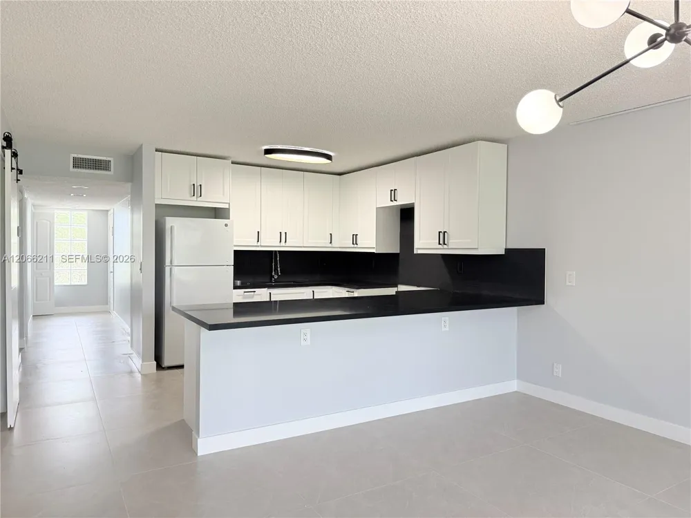 16511 Blatt Blvd #203 Weston, FL 33326