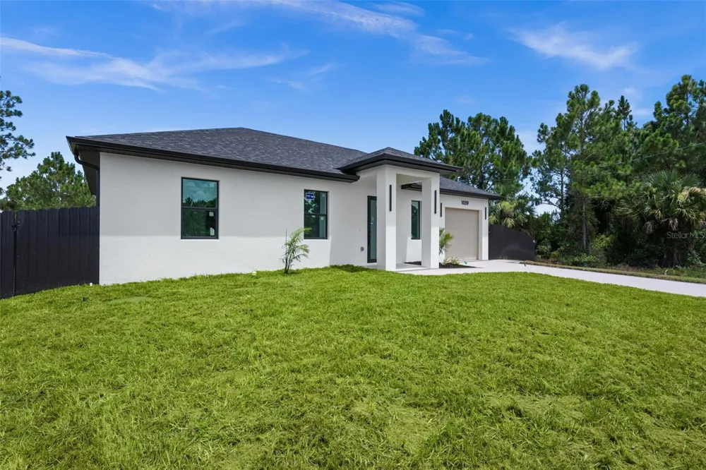 1039 BASSINGER AVENUE S Lehigh Acres, FL 33974