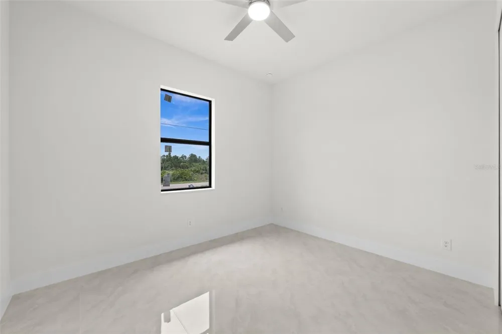 1039 BASSINGER AVENUE S Lehigh Acres, FL 33974