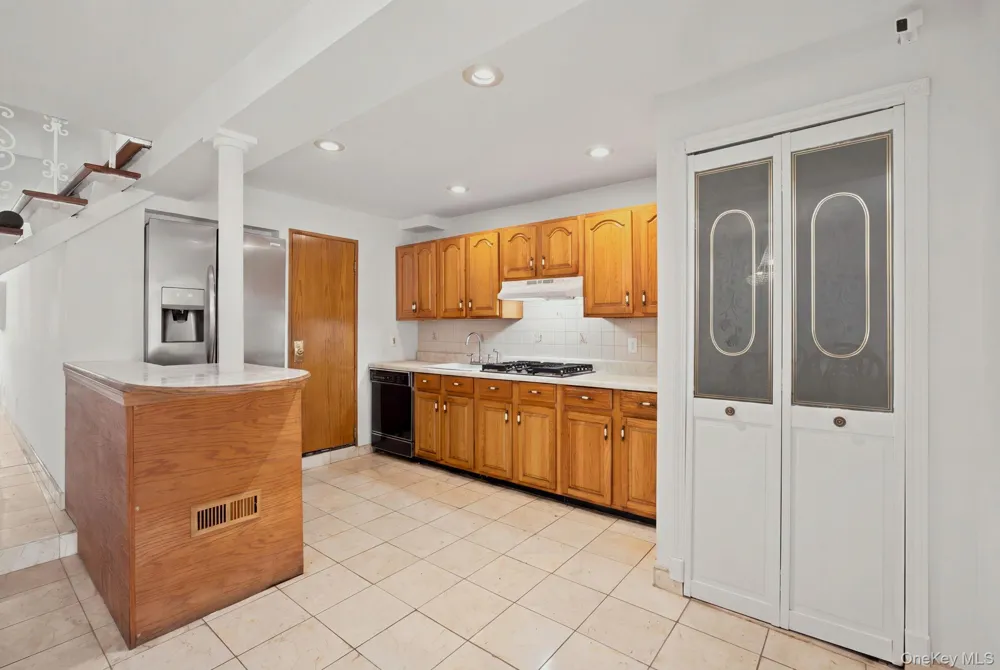 100-06 133rd Avenue Ozone Park, NY 11417
