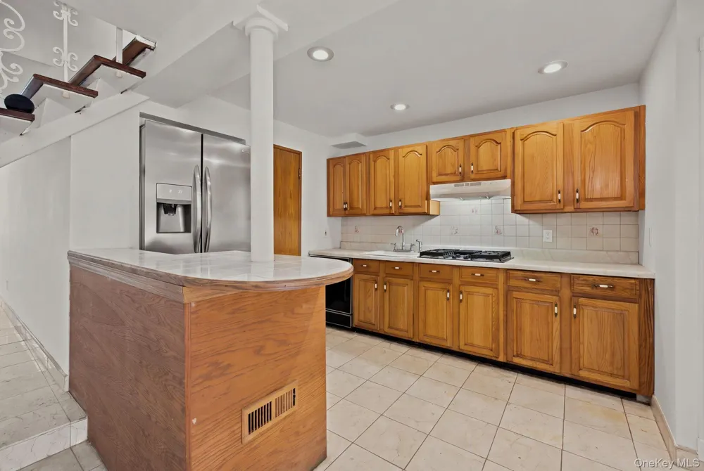100-06 133rd Avenue Ozone Park, NY 11417