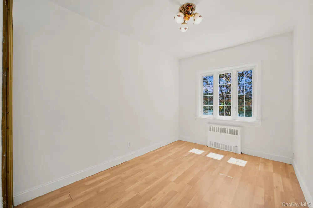 100-06 133rd Avenue Ozone Park, NY 11417