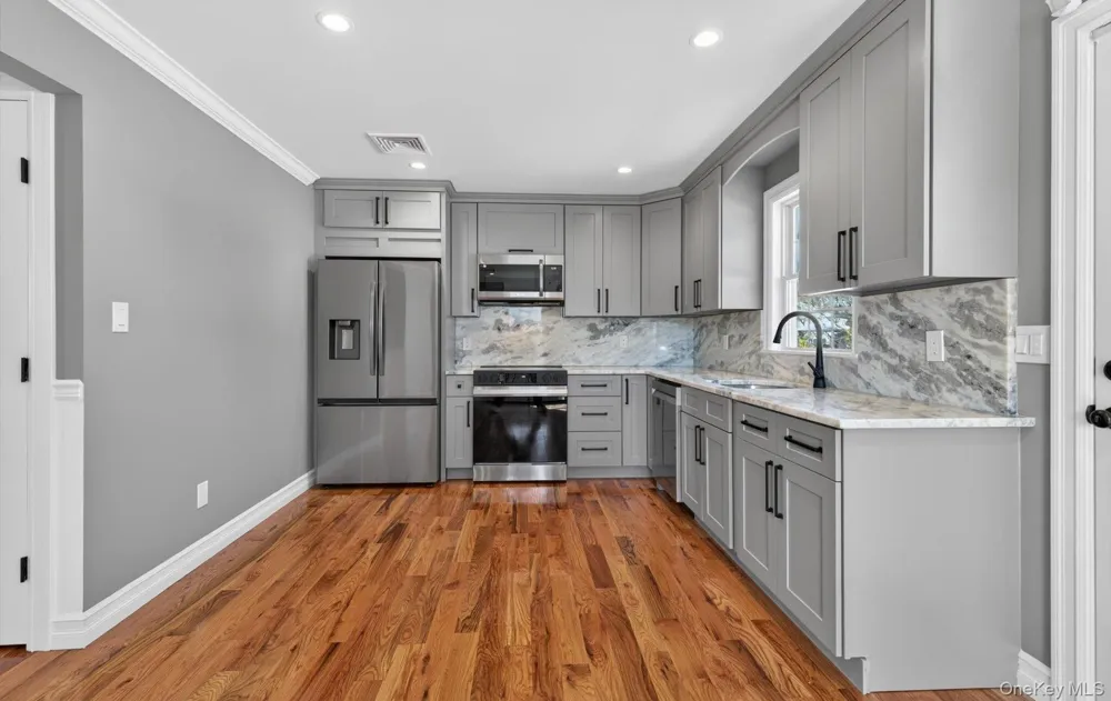 2461 third Avenue East Meadow, NY 11554