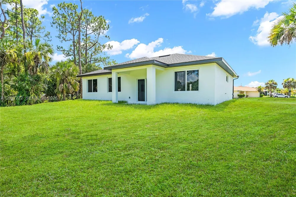 718 718 Robert AVE Lehigh Acres, FL 33936