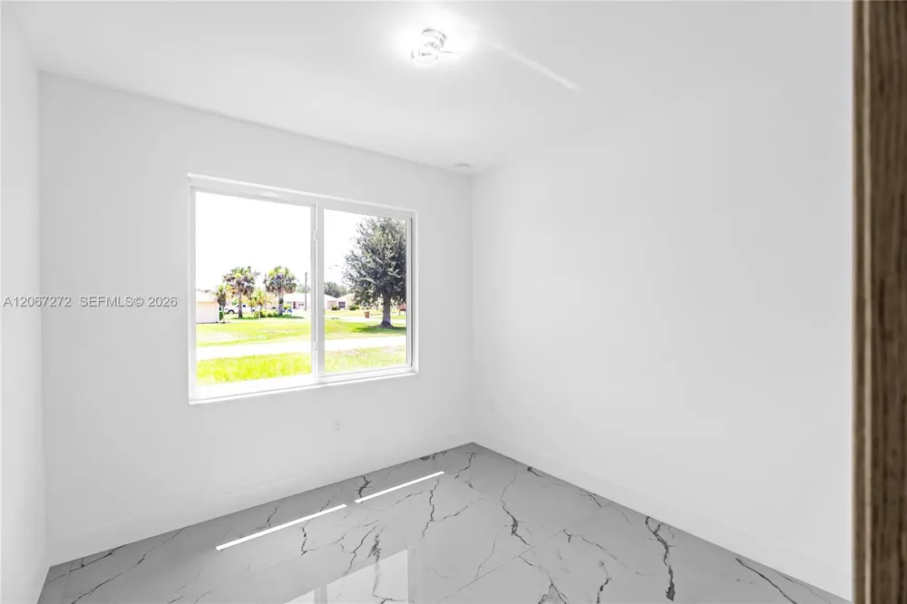 718 718 Robert AVE Lehigh Acres, FL 33936
