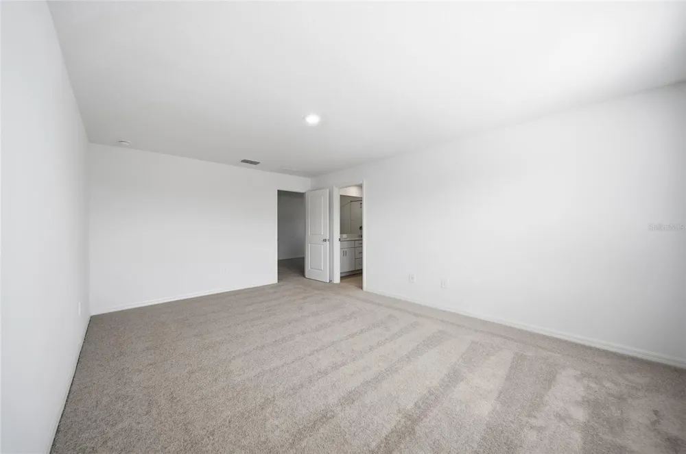 8879 COQUI SONG LANE Land O Lakes, FL 34637