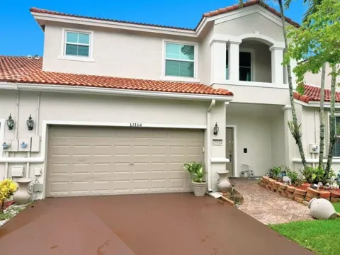 13164 NW 9TH COURT