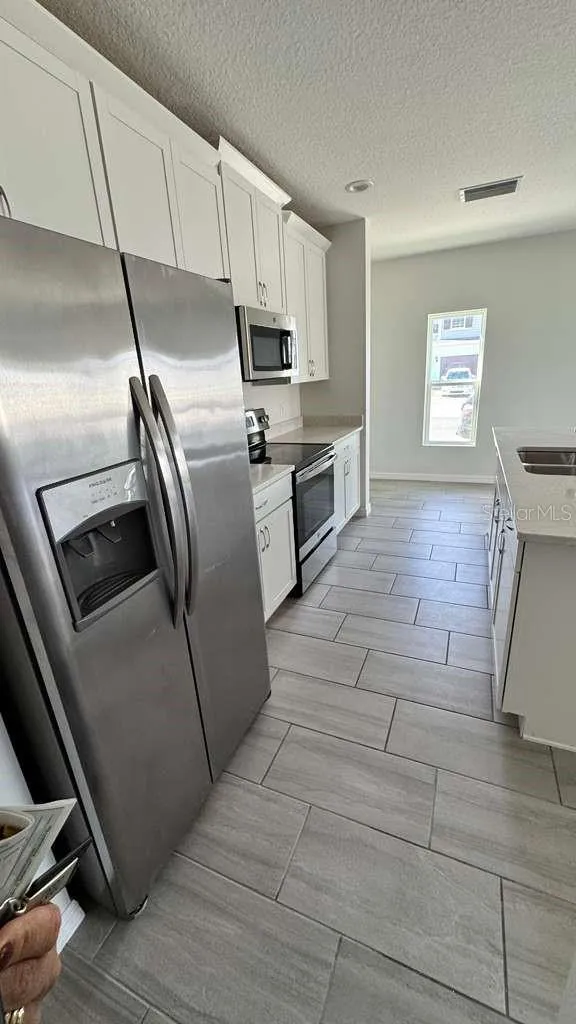 1298 WISPY CYPRESS DRIVE Kissimmee, FL 34746