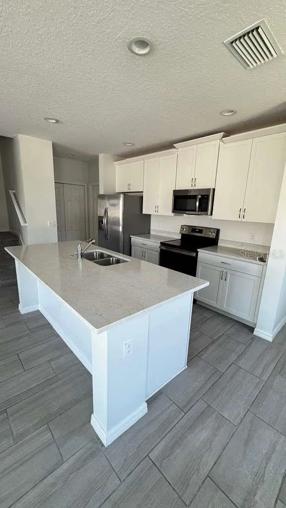 1298 WISPY CYPRESS DRIVE Kissimmee, FL 34746