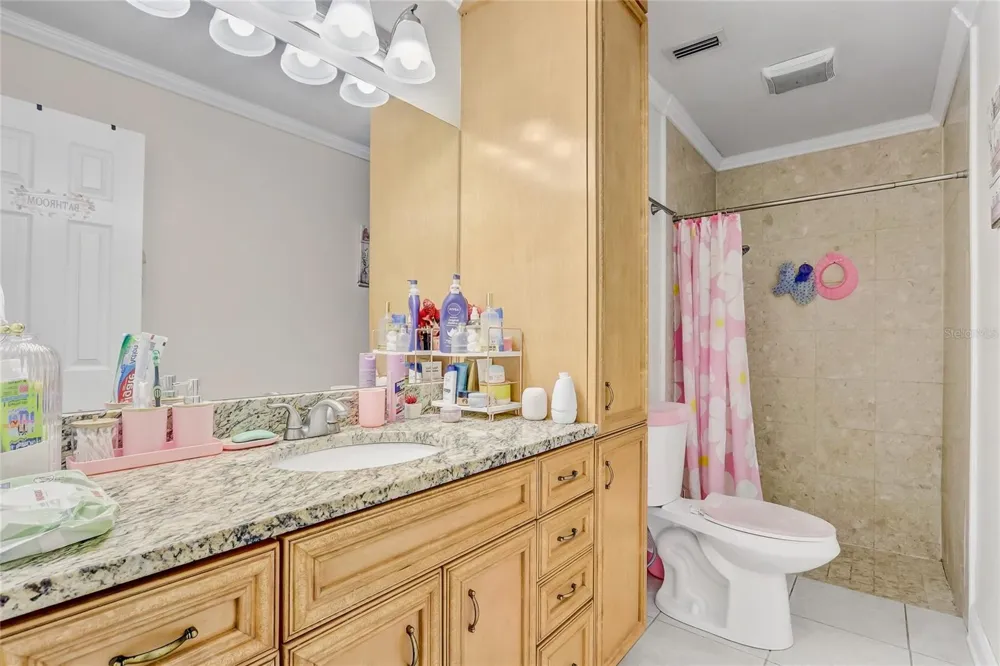 8691 CONTOURA DRIVE Orlando, FL 32810