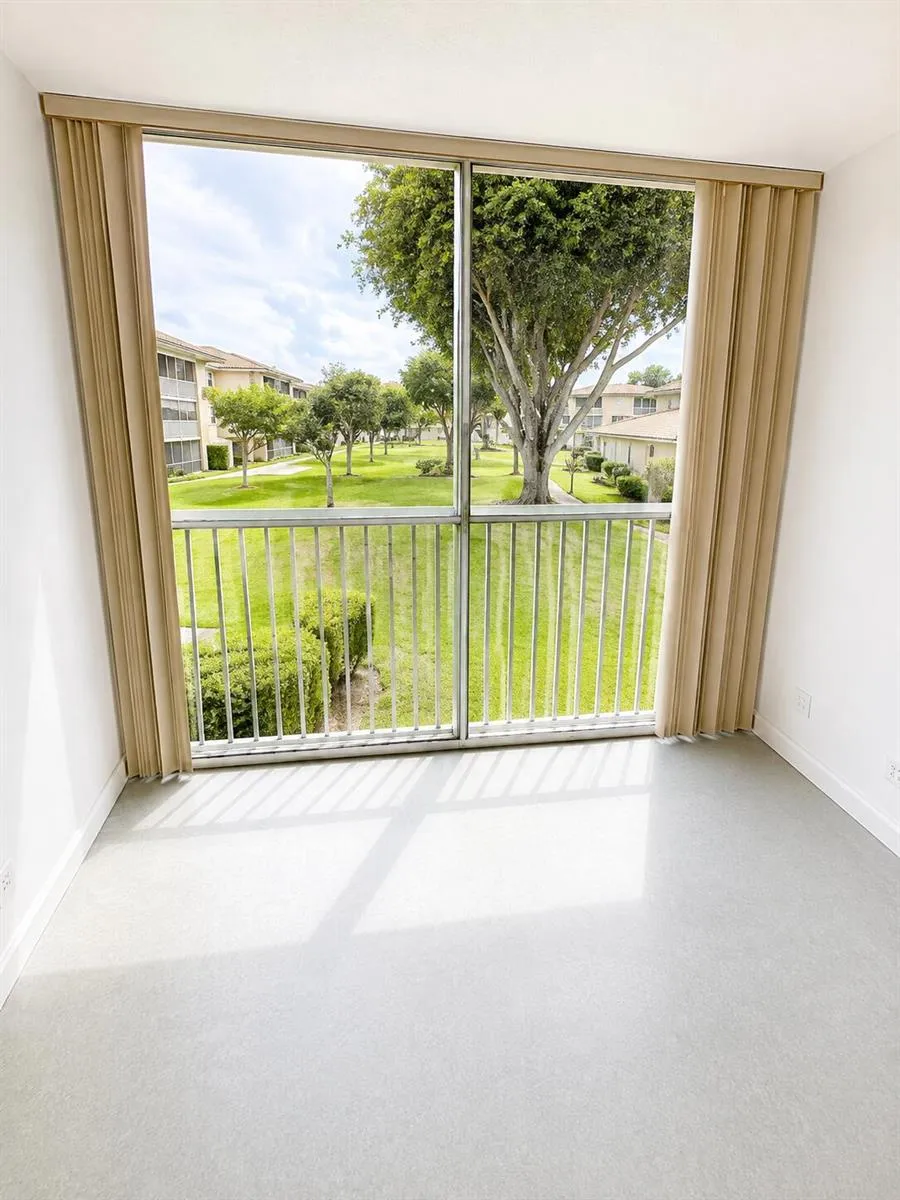 400 VILLAGE GREEN CIRCLE W #205 Palm Springs, FL 33461