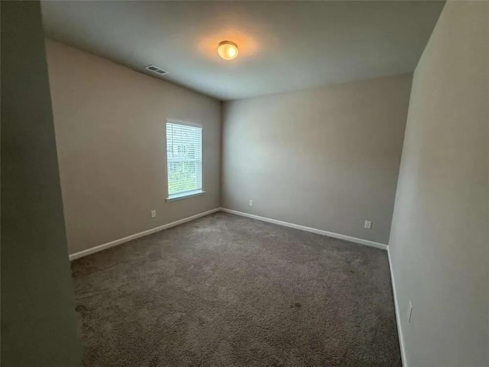 1521 Winding Ridge Trl Hoschton, GA 30548