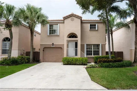 10740 NW 12TH MANOR