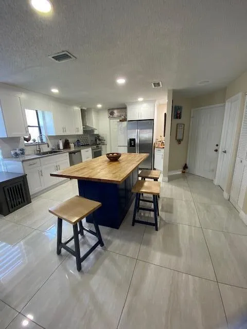 1701 WOODBRIDGE LAKES CIRCLE West Palm Beach, FL 33406