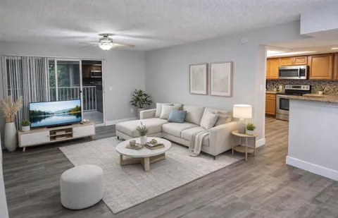5021 WILES ROAD #205