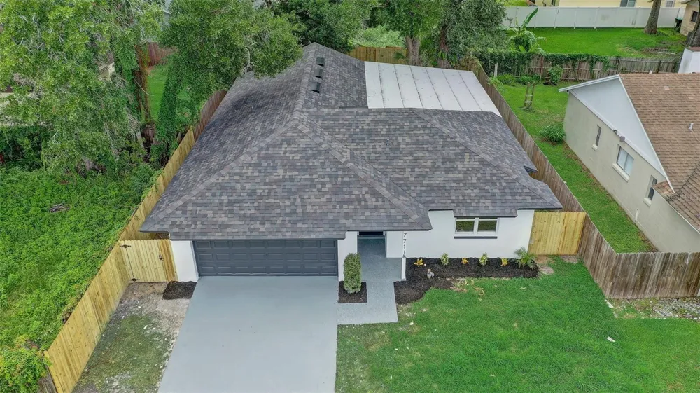 7711 LAKESIDE WOODS DRIVE Orlando, FL 32810