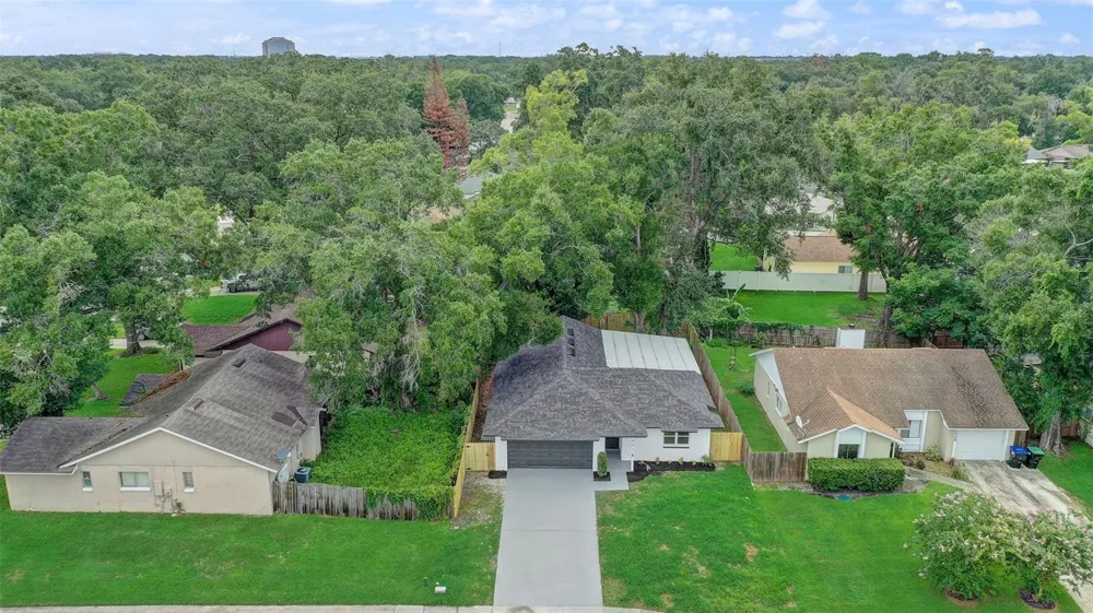 7711 LAKESIDE WOODS DRIVE Orlando, FL 32810