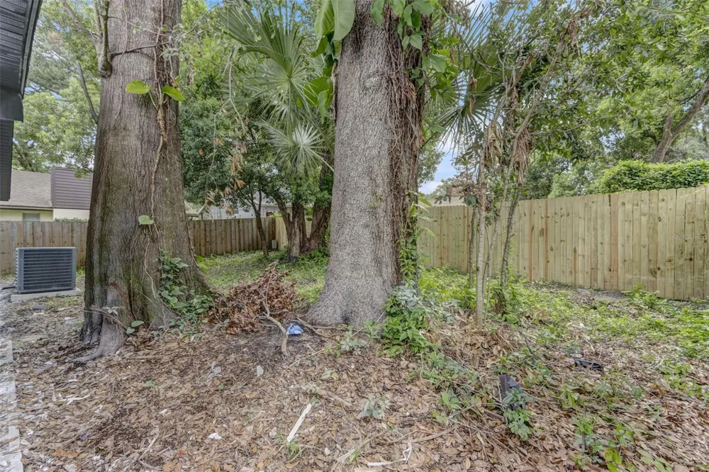 7711 LAKESIDE WOODS DRIVE Orlando, FL 32810