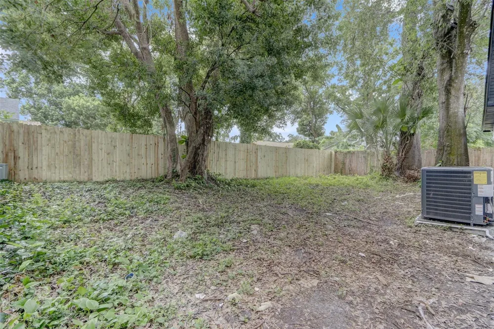 7711 LAKESIDE WOODS DRIVE Orlando, FL 32810