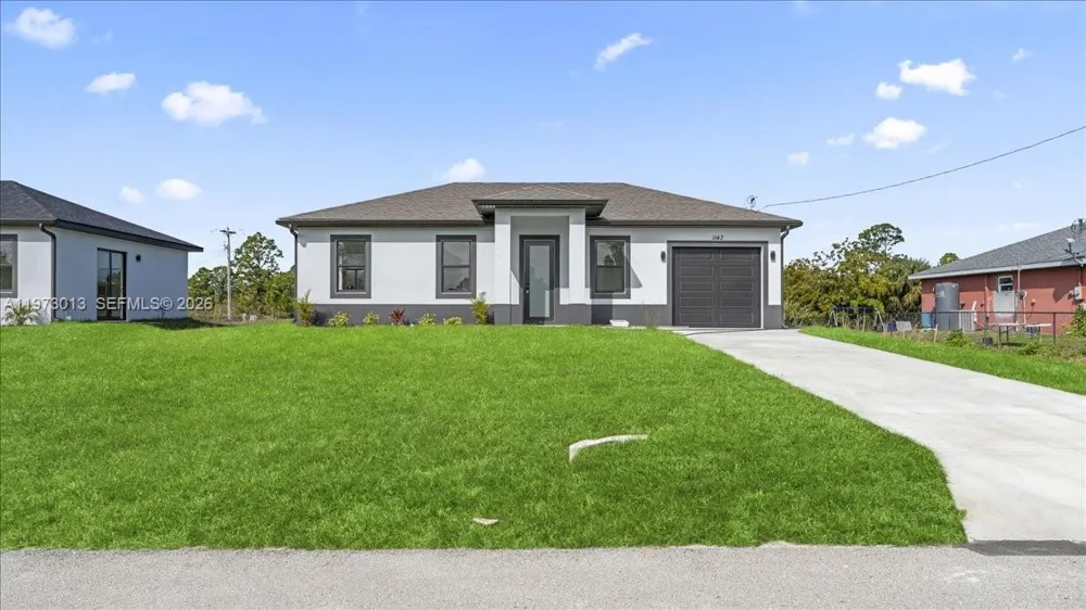 1143 BARFIELD ST E Lehigh Acres, FL 33974