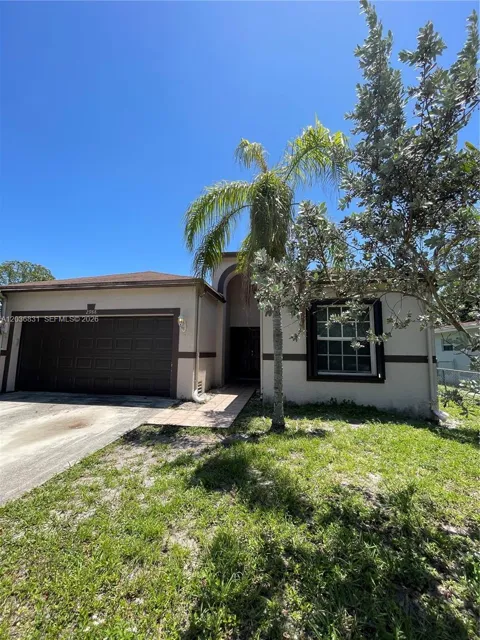 2988 NW 7TH CT