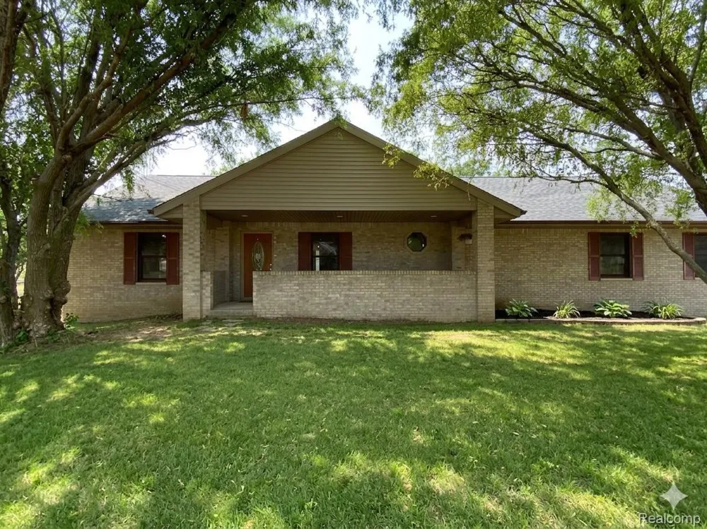 7715 Hidden Knoll Court Conway Township, MI 48418