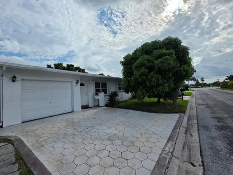 7195 NW 9TH COURT