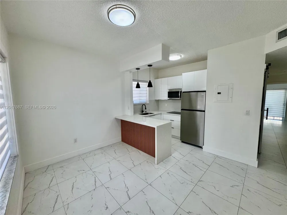 421 NW 13th Ave #A Miami, FL 33125