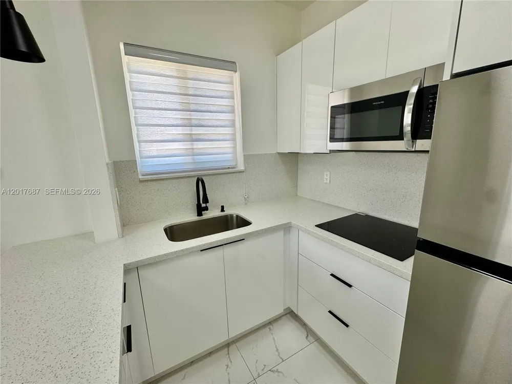 421 NW 13th Ave #A Miami, FL 33125