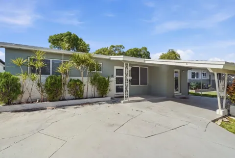 309 SW 7TH COURT