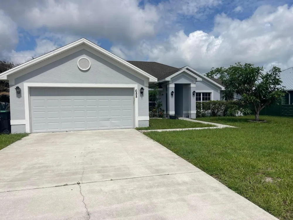 688 SW HEATHER STREET Port St. Lucie, FL 34983