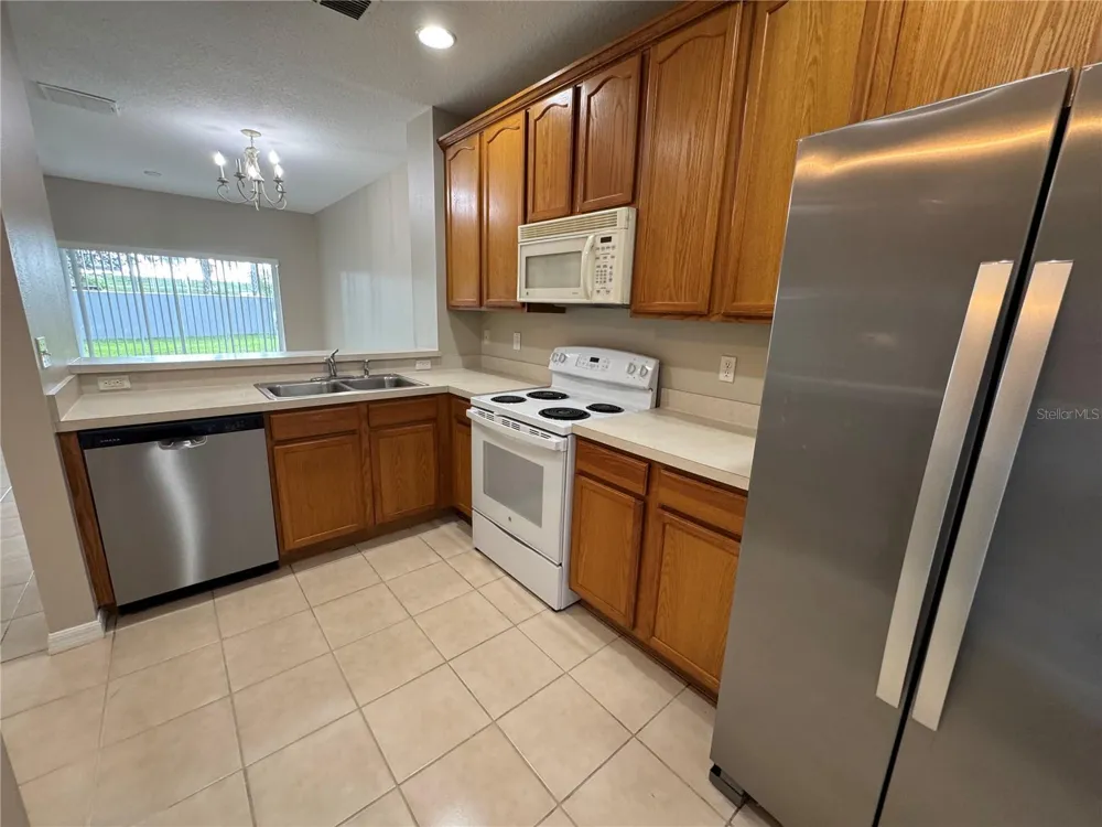 9472 FLOWERING COTTONWOOD ROAD #77 Orlando, FL 32832