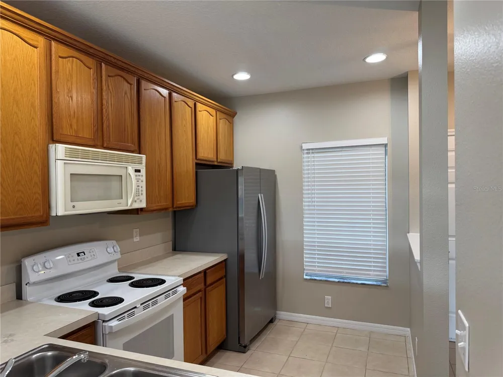 9472 FLOWERING COTTONWOOD ROAD #77 Orlando, FL 32832