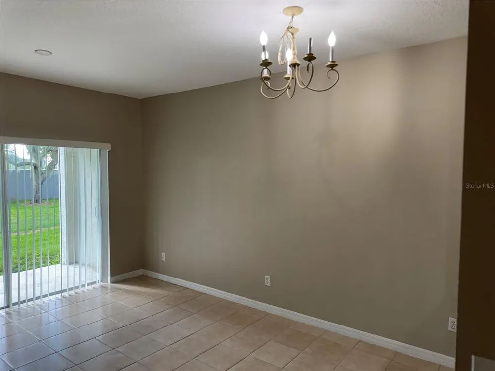 9472 FLOWERING COTTONWOOD ROAD #77 Orlando, FL 32832