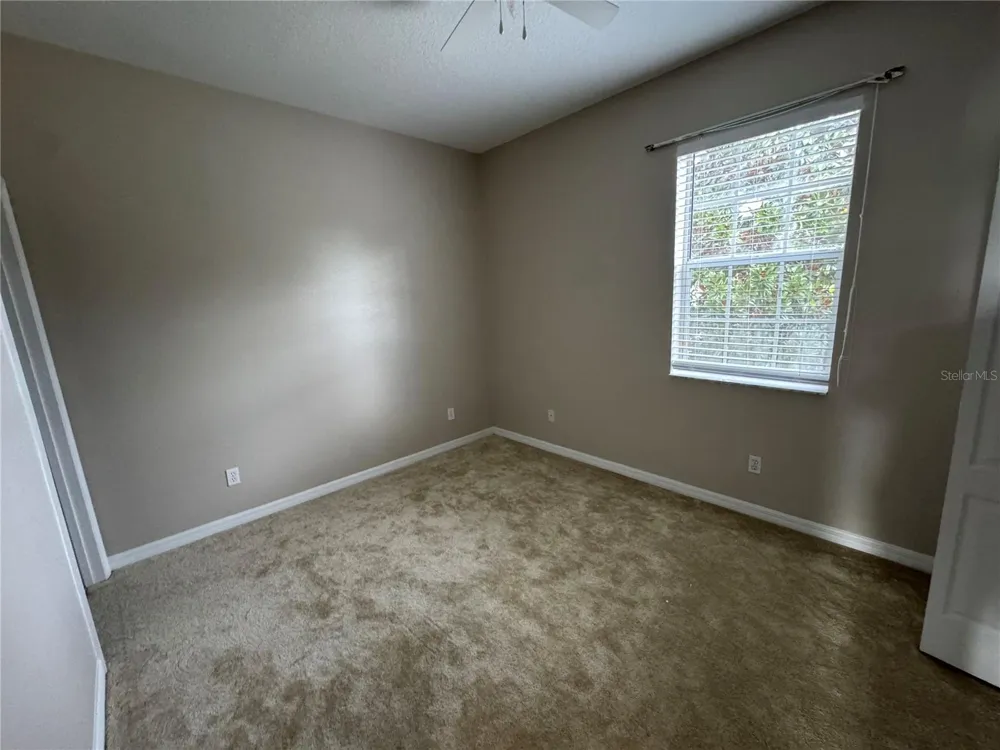 9472 FLOWERING COTTONWOOD ROAD #77 Orlando, FL 32832